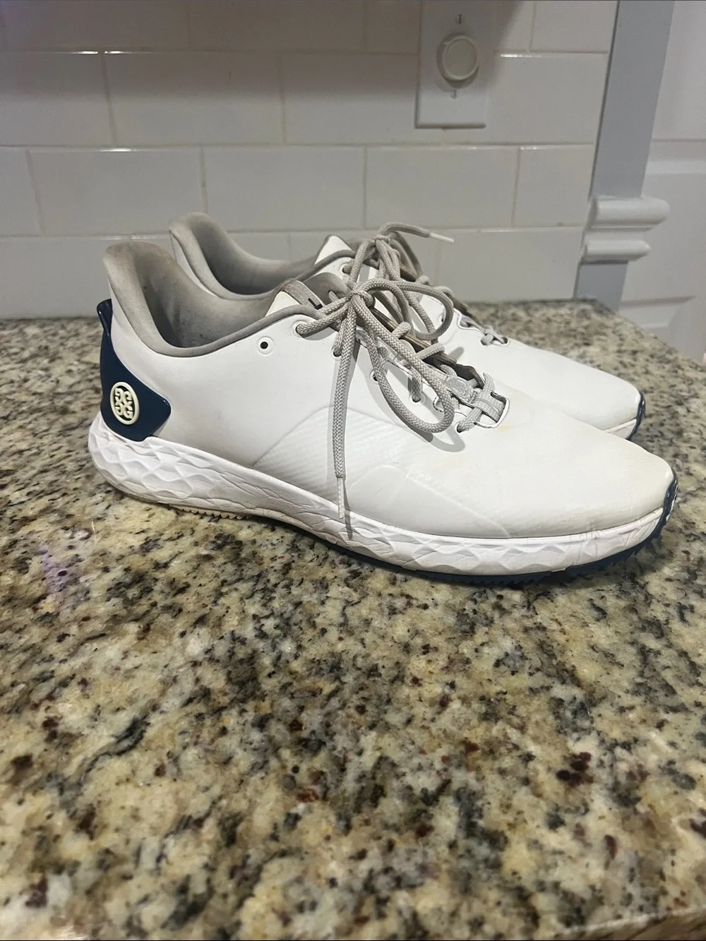 G/FORE White Sneakers with Navy Heel Badge